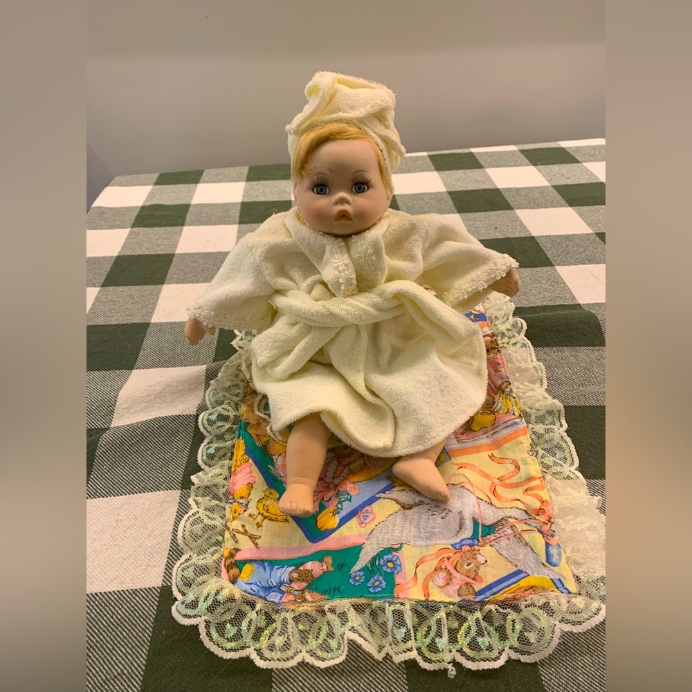 Collectible 1990s porcelain doll with music box